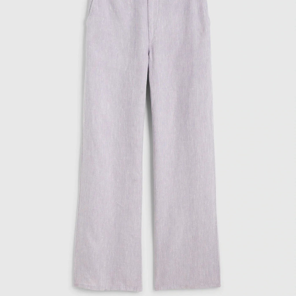Light lavender wide-leg trousers with a subtle textured weave, shown flat against a light gray background.